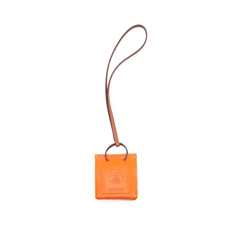 hermes-orange-bag-charm-feu-gold