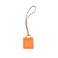 hermes-orange-bag-charm-feu-gold