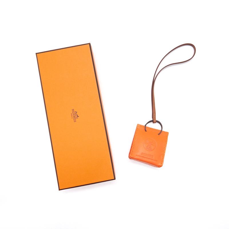 hermes-orange-bag-charm-feu-gold