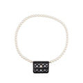chanel-card-holder-with-maxi-pearls-chain-lambskin-black-lghw
