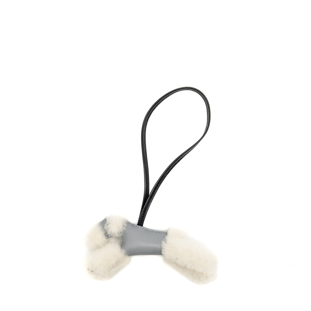 hermes-budy-shearing-bag-charm-wool-lambskin-ecru-panti-black-stamp-k-copy