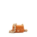 chanel-mini-wenge-wood-flap-bag-metier-d-art-limited-edition-lambskin-wood-orange-ghw-microchip