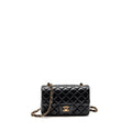 chanel-mini-rectangular-flap-bag-lambskin-black-rghw-microchip