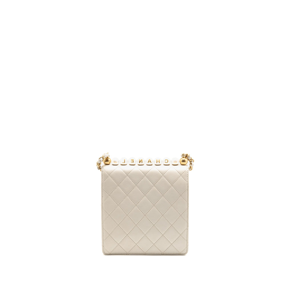 chanel-pearl-quilted-flap-bag-lambskin-white-ghw