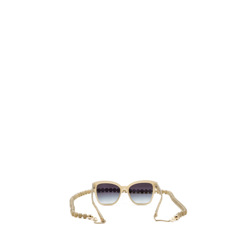 chanel-sunglasses-with-pearl-chain-light-grey