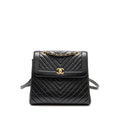 chanel-chevron-frame-quilted-backpack-aged-calfskin-black-ghw