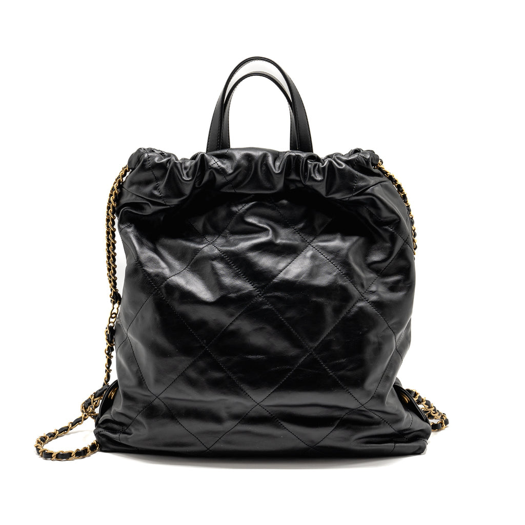 chanel-22-backpack-white-letter-logo-shiny-calfskin-black-ghw-microchip