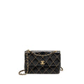 chanel-vintage-quilted-flap-bag-lambskin-black-white-stitching-ghw