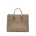 copy-of-louis-vuitton-on-the-go-mm-monogram-empreinte-tourterelle-ghw
