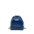 chanel-small-gabrielle-backpack-aged-calfskin-blue-multicolour-hardware