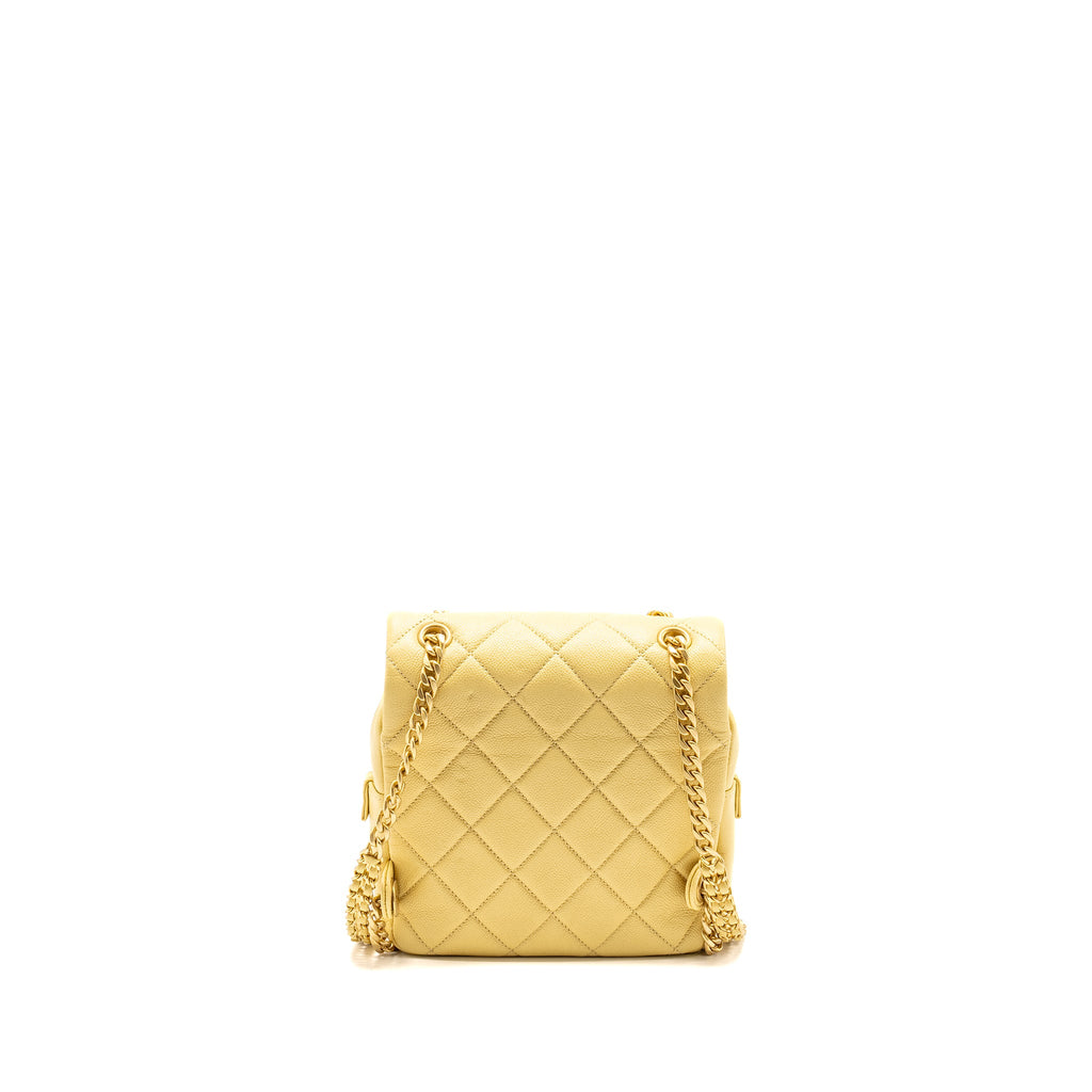 chanel-22p-quilted-flap-backpack-caviar-light-yellow-ghw-microchip-copy-1