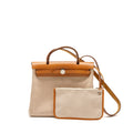 hermes-herbag-31-zip-bag-toile-criss-viking-vache-hunter-leather-ecru-beige-nature-nature-shw-stamp-y