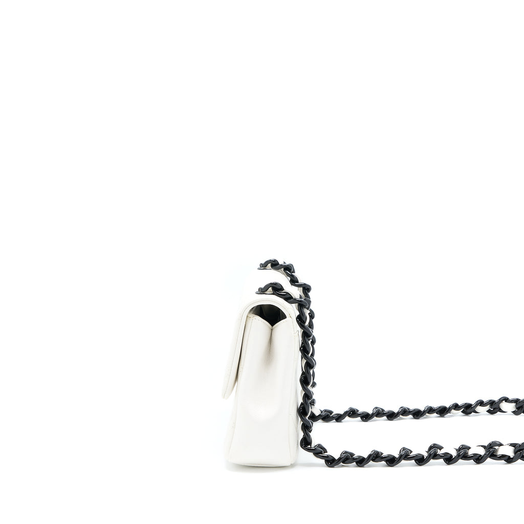 chanel-seasonal-flap-bag-caviar-white-with-black-hardware