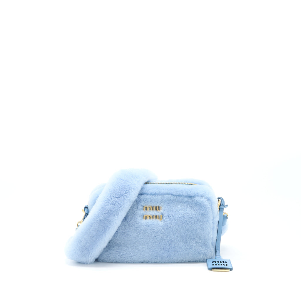 miu-miu-top-handle-crossbody-camera-bag-shearling-light-blue-ghw