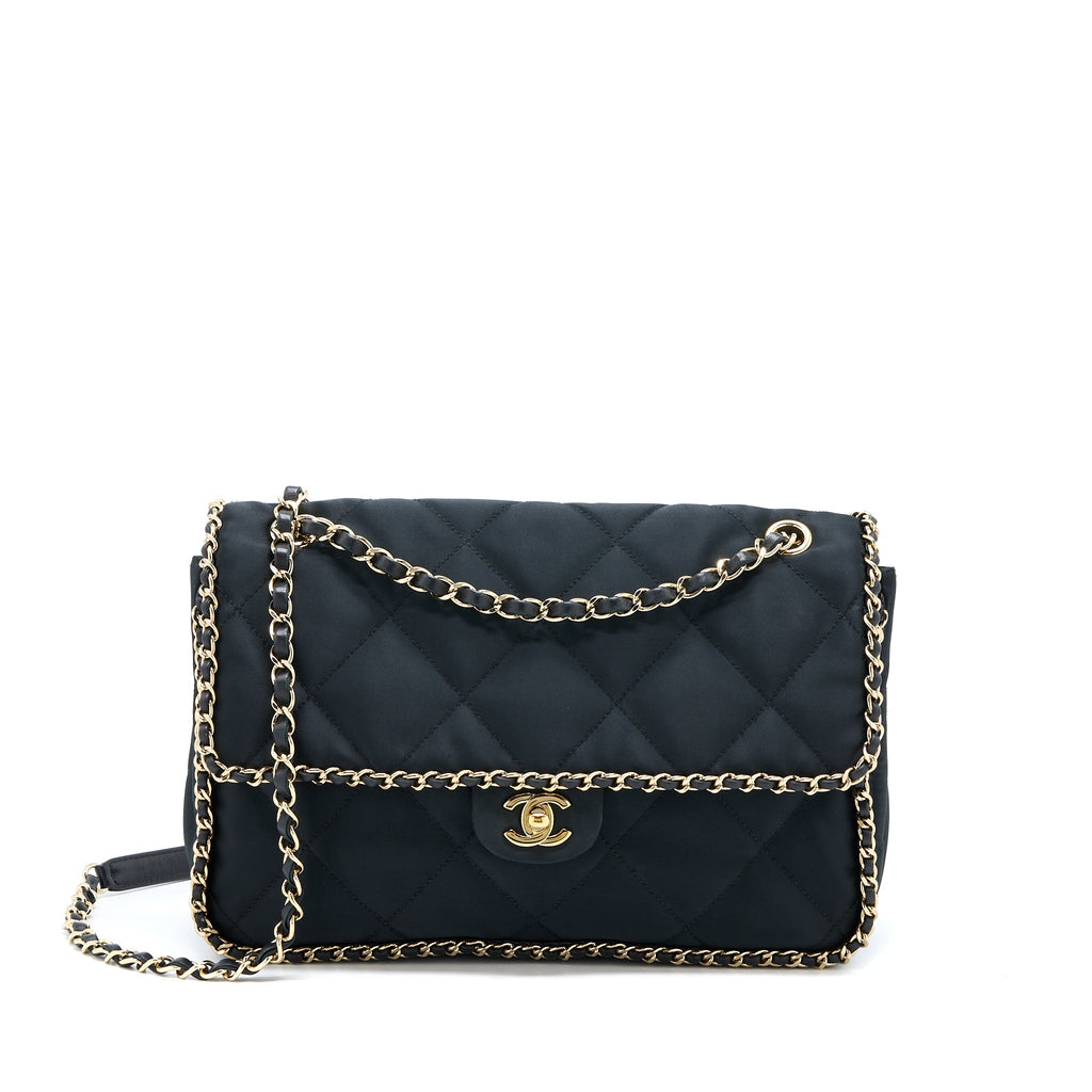 chanel-seasonal-flap-bag-fabric-black-ghw