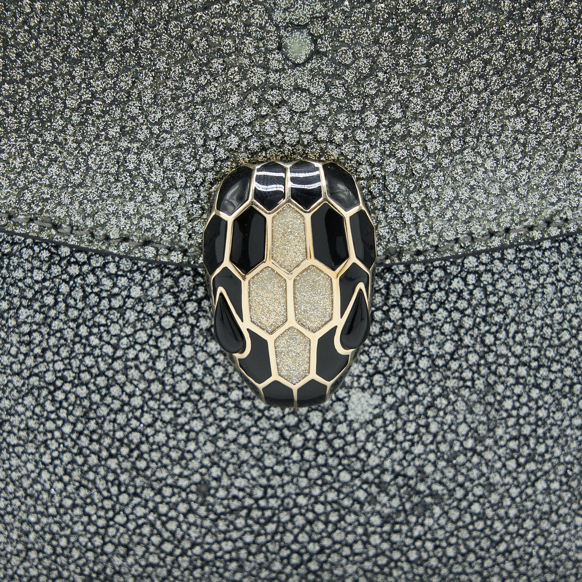 bvlgari-serpenti-forever-clutch-with-chain-stingray-leather-grey-lghw