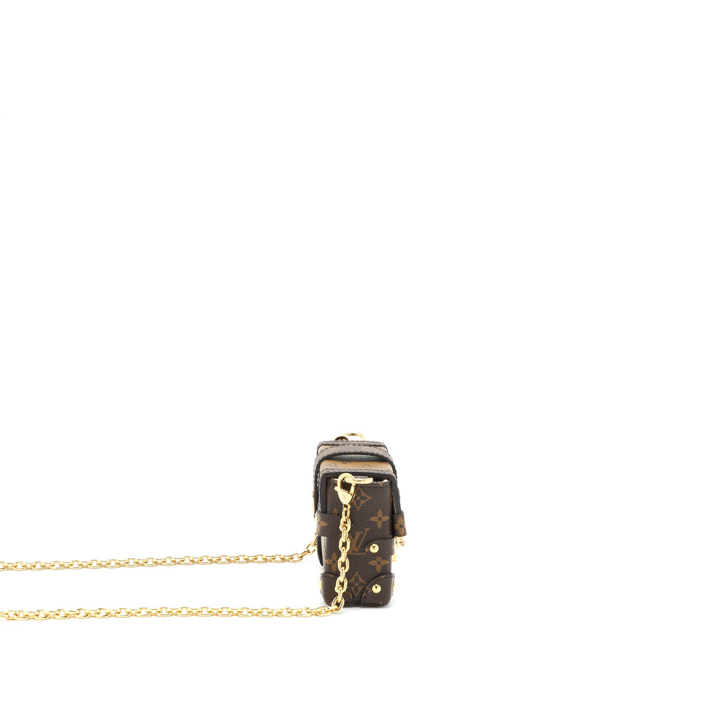 louis-vuitton-essential-trunk-with-chain-in-reverse