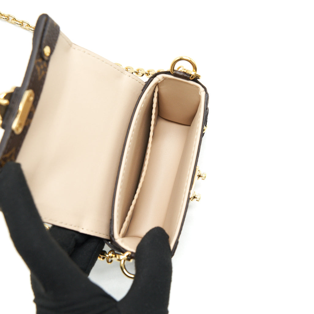 louis-vuitton-essential-trunk-with-chain-in-reverse