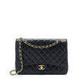 chanel-maxi-classic-double-flap-bag-caviar-black-ghw