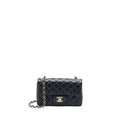 chanel-classic-mini-rectangular-flap-bag-lambskin-black-lghw-microchip-1