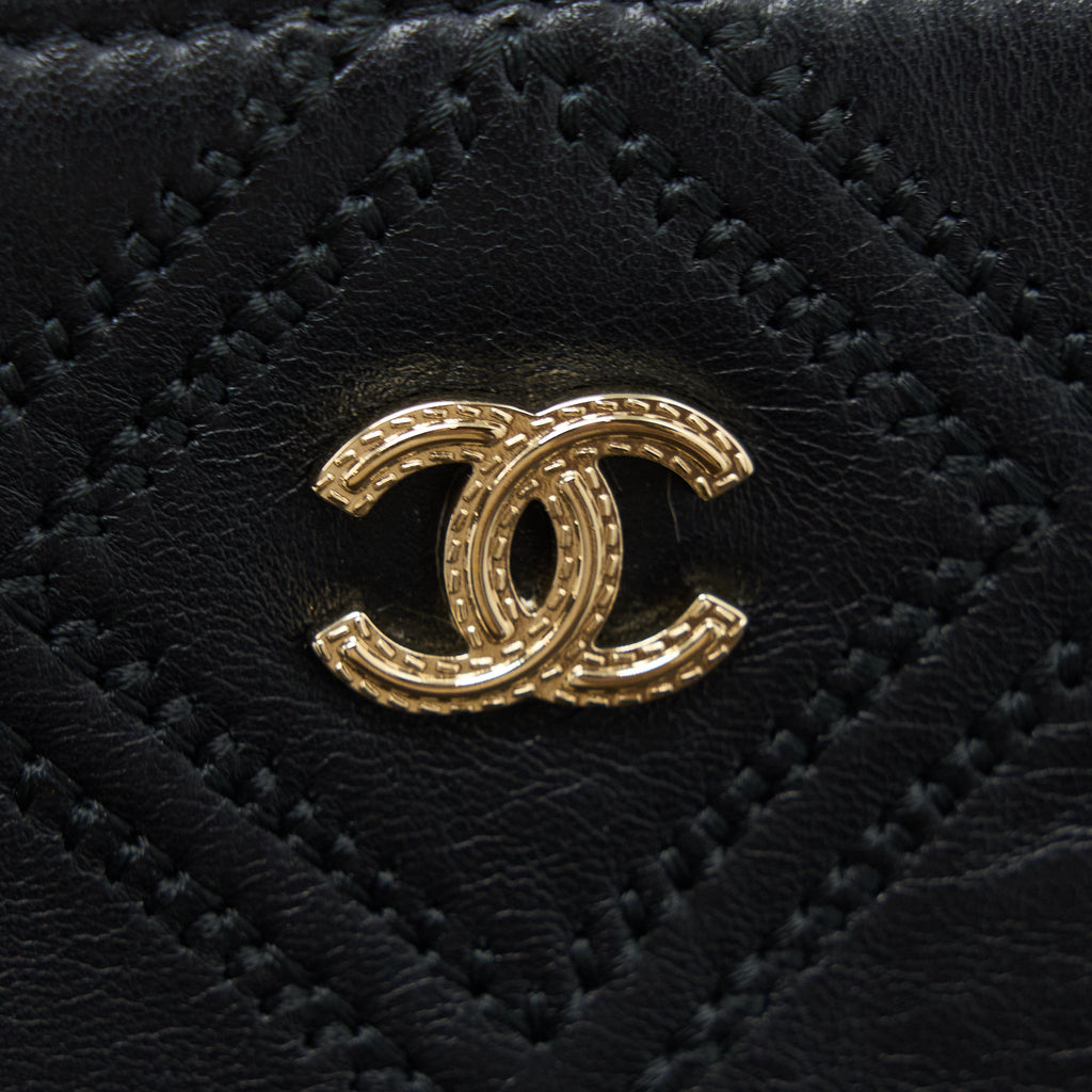 chanel-quilted-pouch-with-tassel-black-lghw