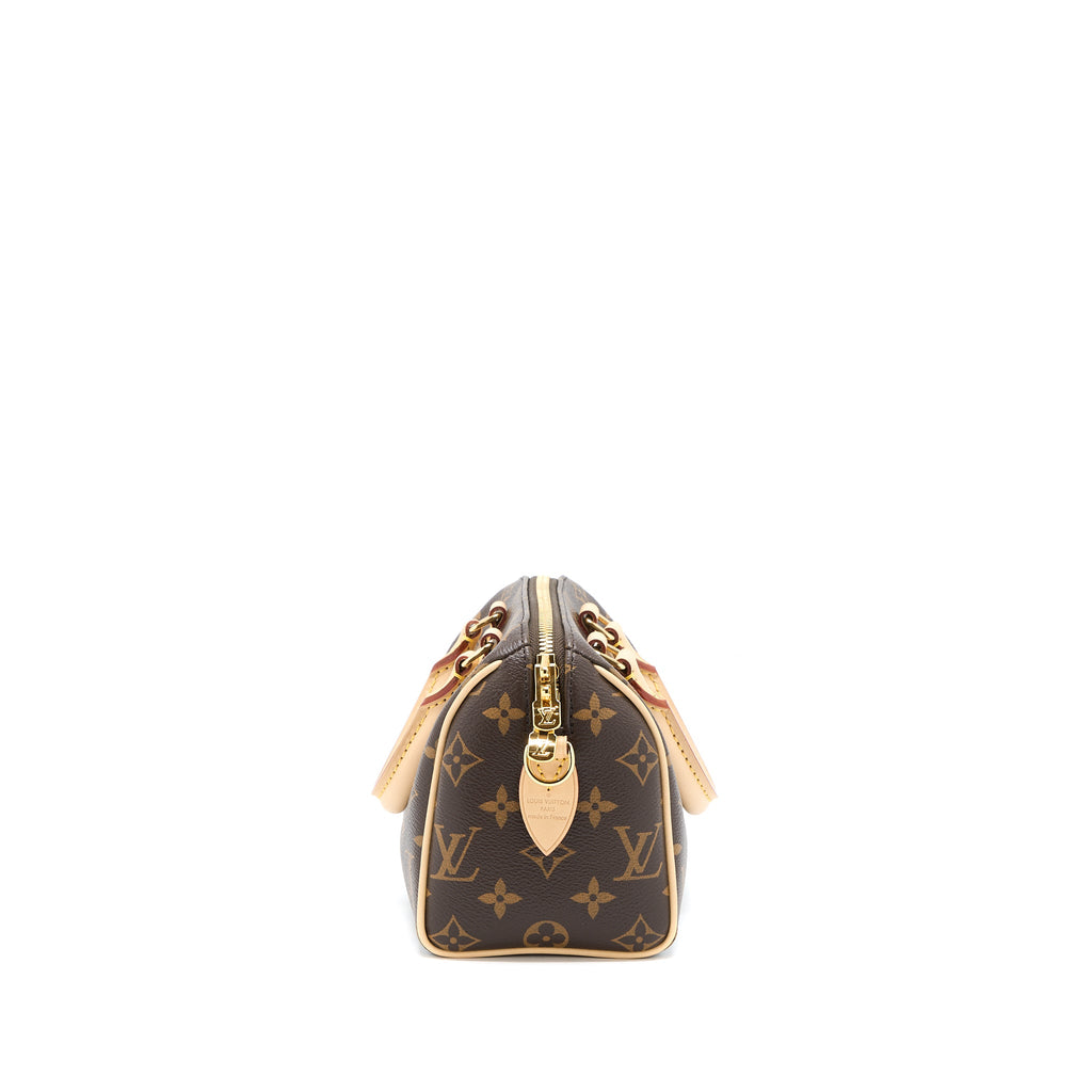 louis-vuitton-speedy-bandouliere-20-monogram-canvas-with-fuchsia-strap