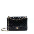 chanel-maxi-classic-flap-bag-lambskin-black-ghw