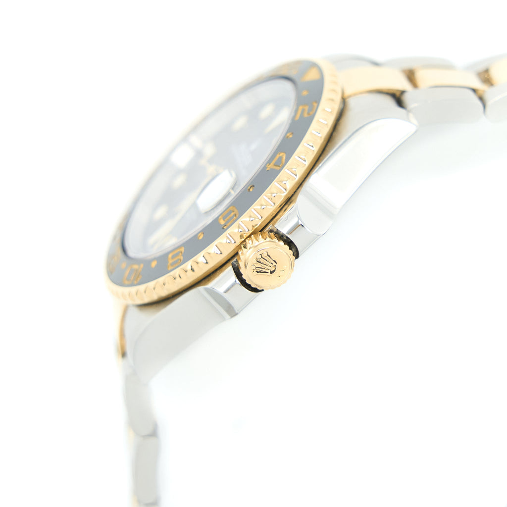 copy-of-rolex-gmt-master-ii-40mm-oystersteel-yellow-gold-black-dial-m116713ln