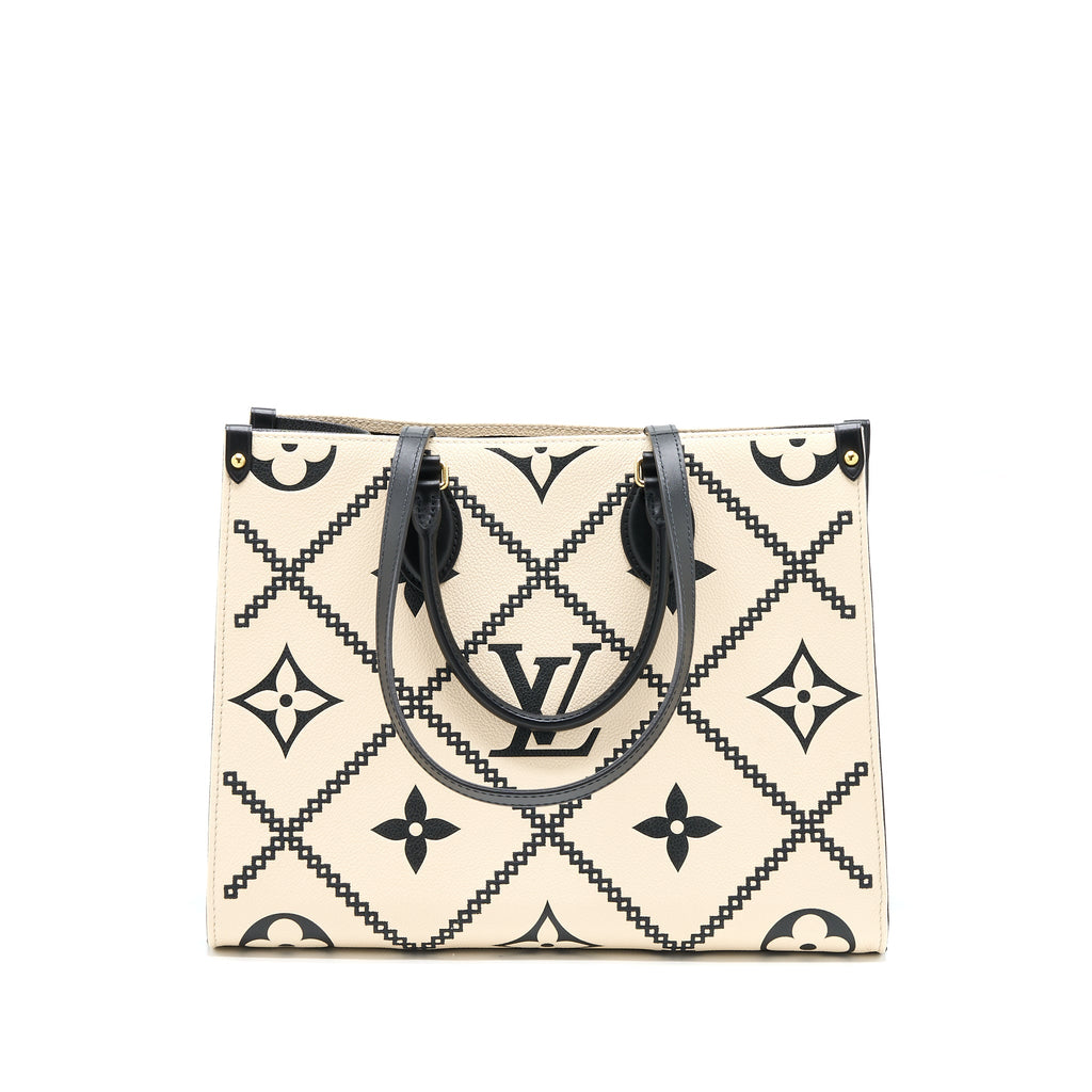 louis-vuitton-onthego-mm-empreinte-cream-black-ghw-new-version