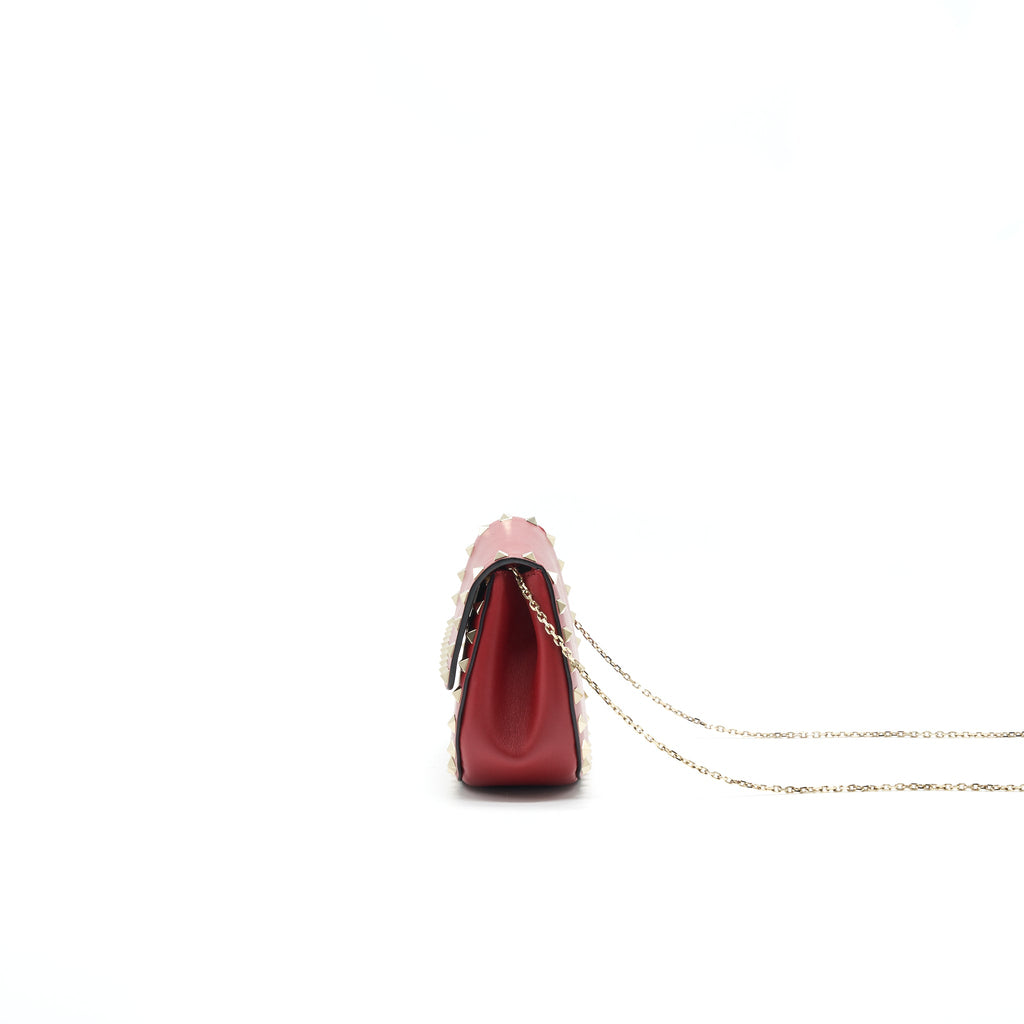 valentino-rockstud-small-saddle-bag-in-red