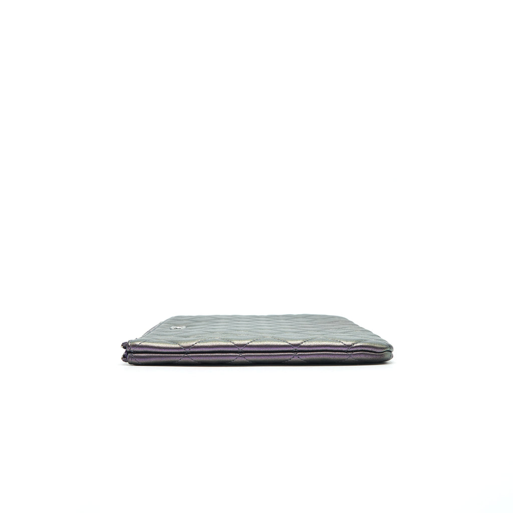 chanel-quilted-leather-clutch-bag-in-metallic-purple
