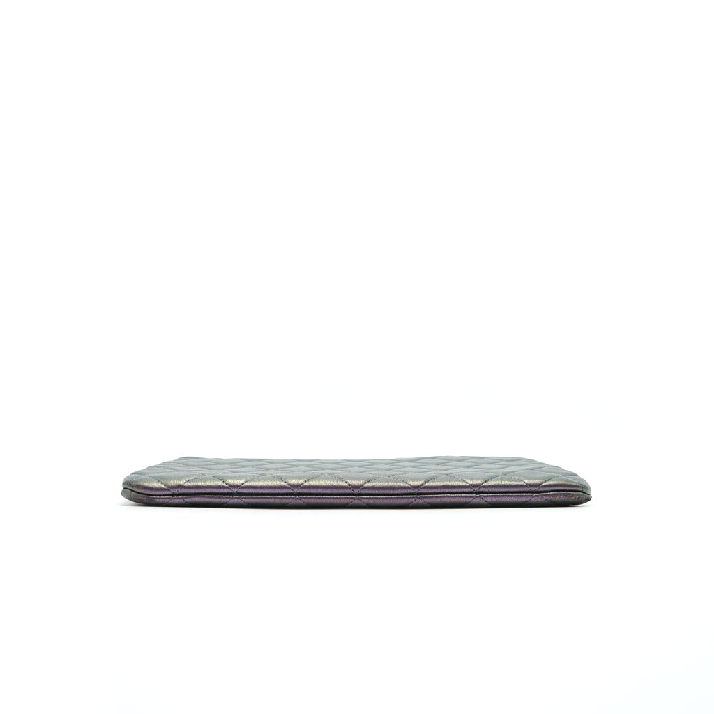 chanel-quilted-leather-clutch-bag-in-metallic-purple