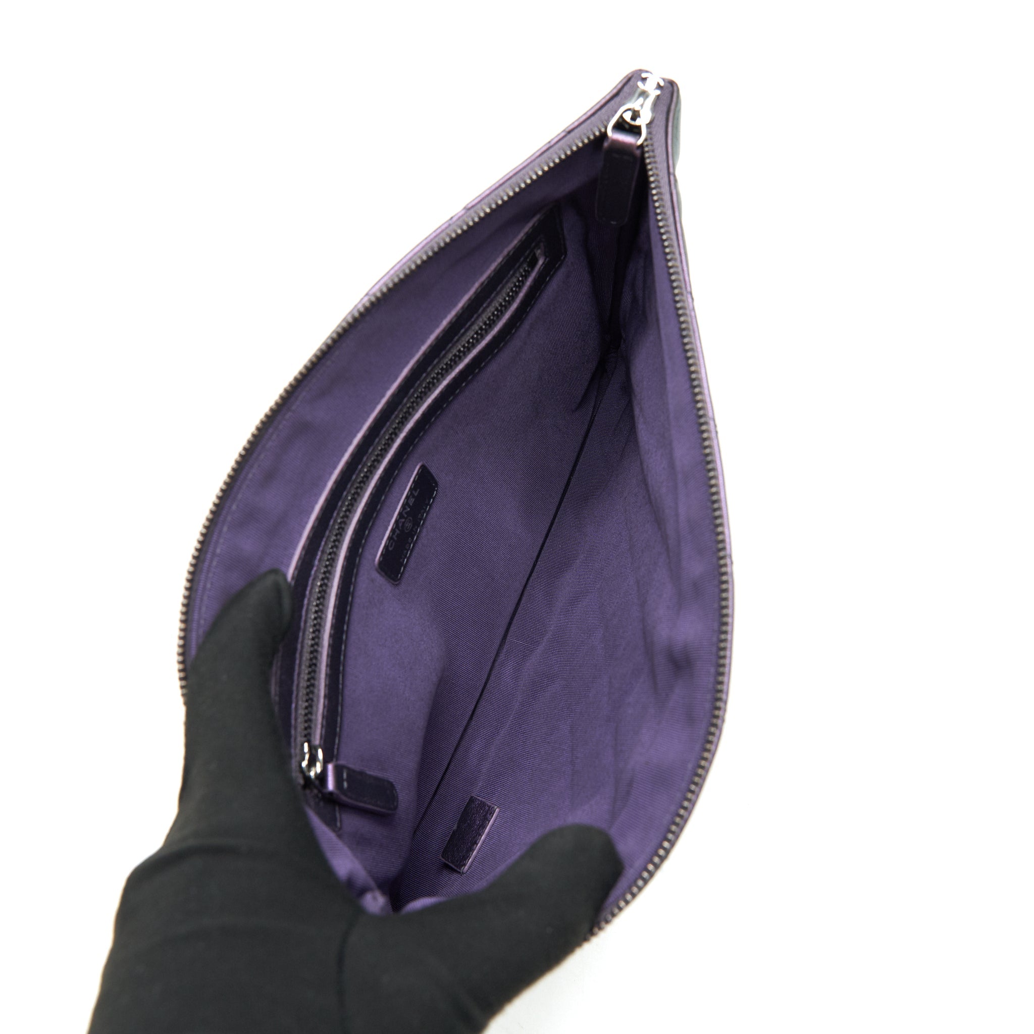 chanel-quilted-leather-clutch-bag-in-metallic-purple