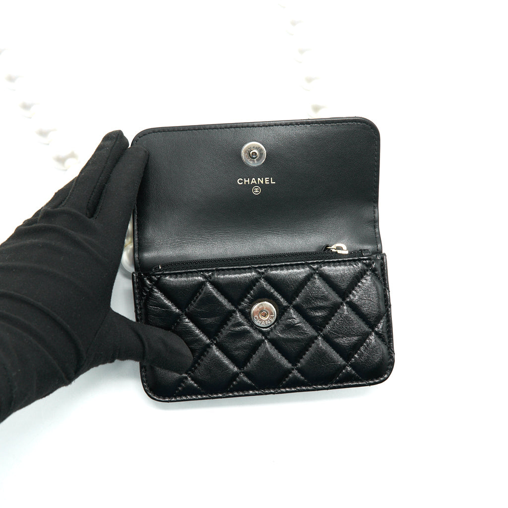 chanel-giant-pearl-clutch-with-chain-calfskin-black-lghw