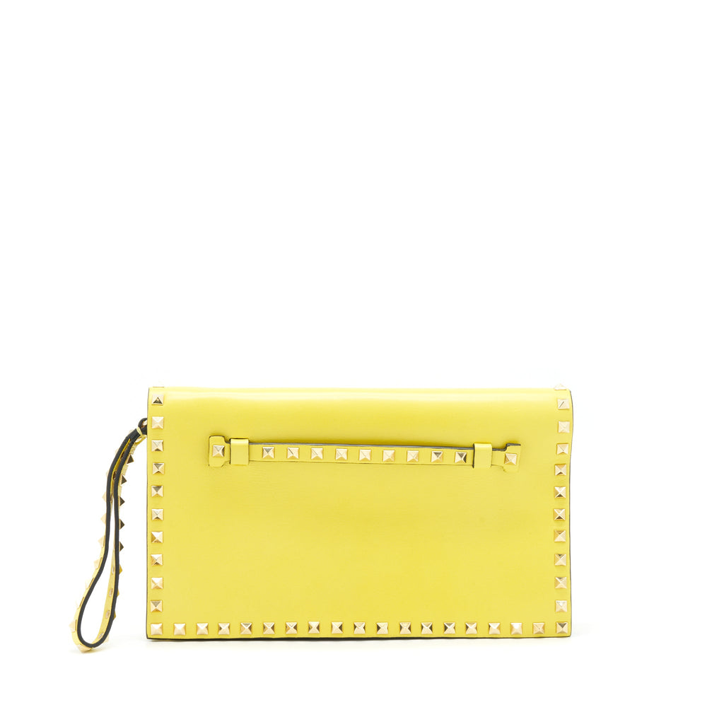 valentino-rockstud-clutch-bag-yellow-ghw