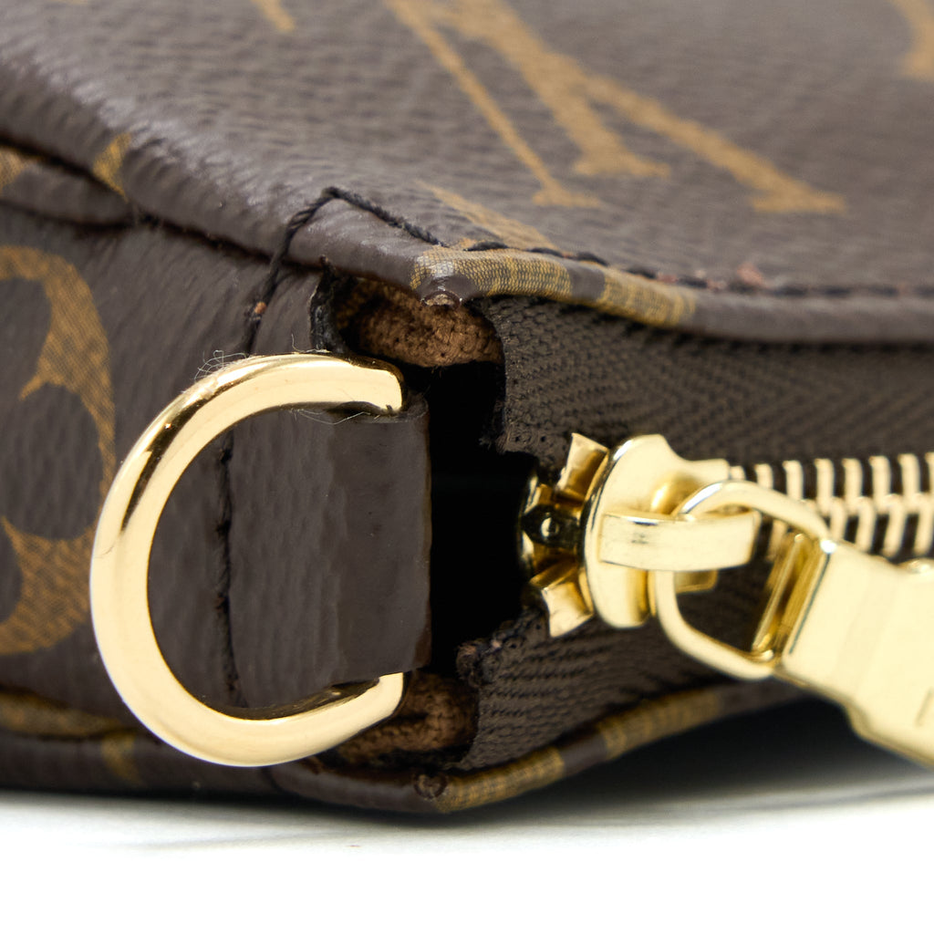 louis-vuitton-pochette-accessories-monogram-canvas-ghw-new-version-1