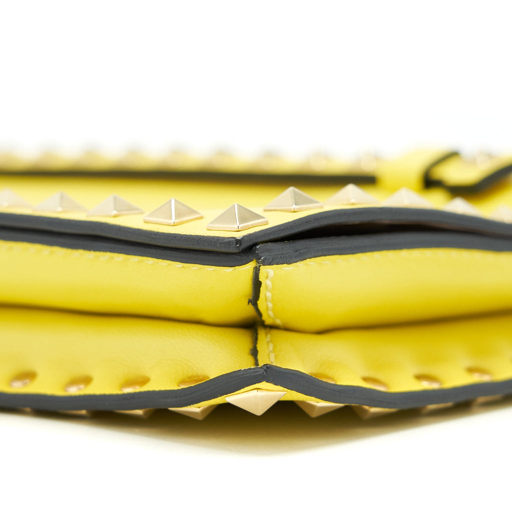 valentino-rockstud-clutch-bag-yellow-ghw