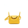 hermes-mini-lindy-9d-jaune-ambre-ghw