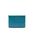 chanel-quilted-leather-clutch-bag-in-patent-blue