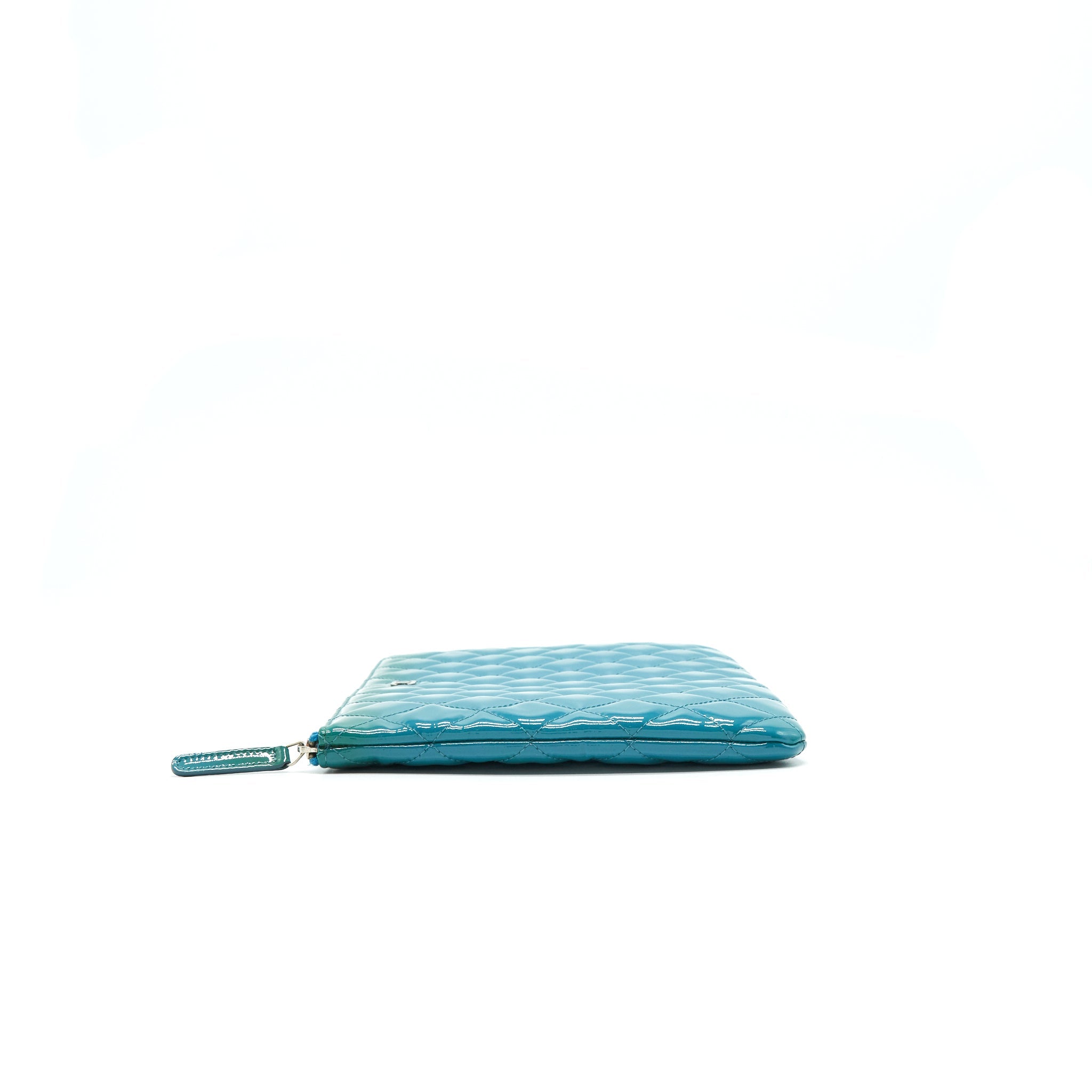 chanel-quilted-leather-clutch-bag-in-patent-blue