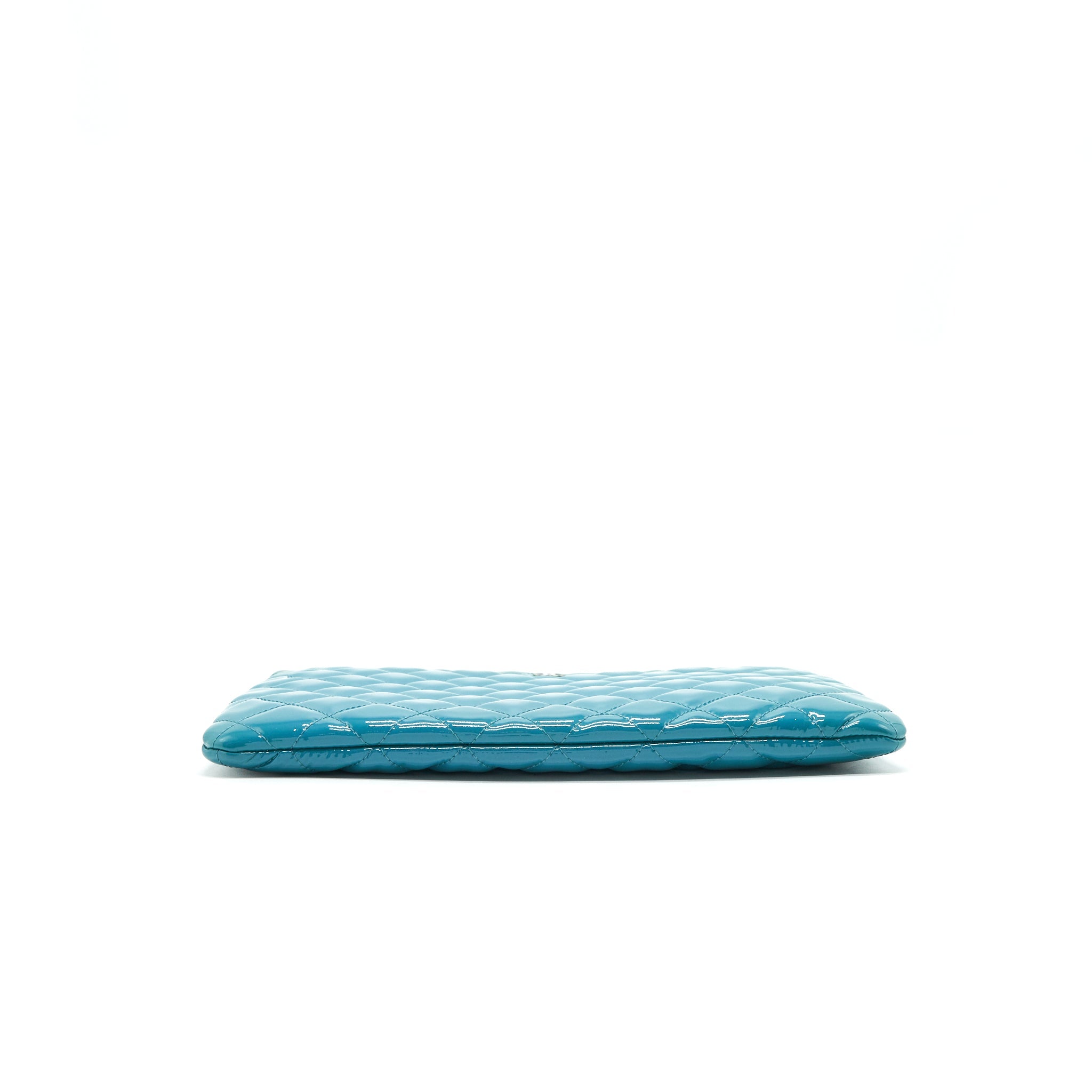 chanel-quilted-leather-clutch-bag-in-patent-blue