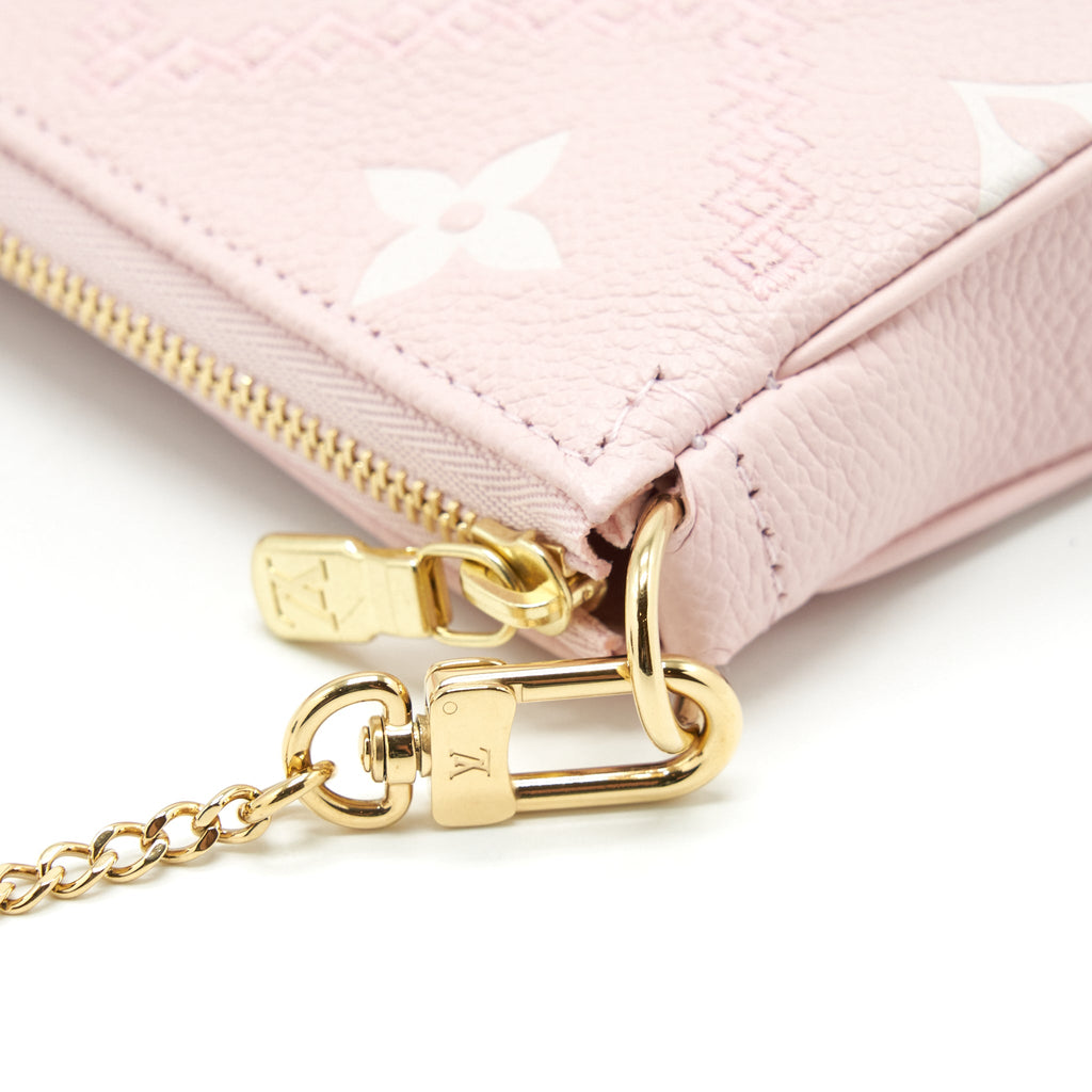 louis-vuitton-mini-pochette-monogram-empreinte-pink-ghw