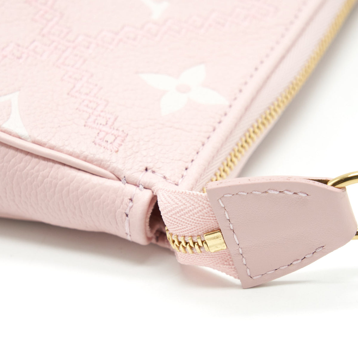 louis-vuitton-mini-pochette-monogram-empreinte-pink-ghw