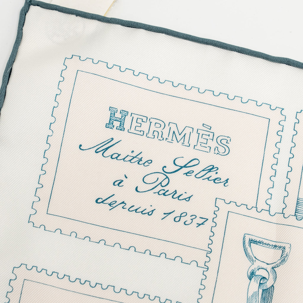 hemes-90cm-silk-scarf-le-philateliste-du-faubourg-rose-pale-gris-blanc
