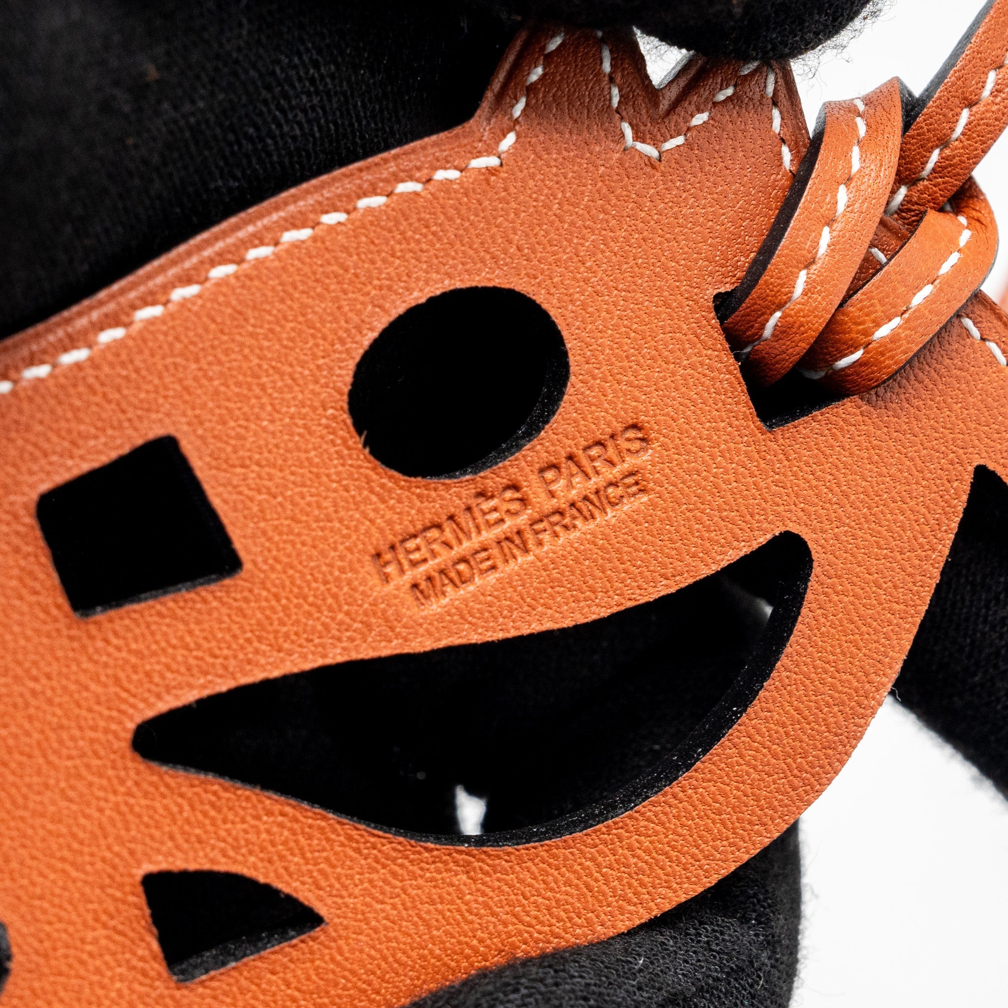 hermes-horse-head-leather-bag-charm-brown