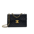 chanel-vintage-maxi-flap-bag-black-24k-ghw