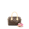 louis-vuitton-speedy-bandouliere-20-monogram-canvas-with-fuchsia-strap-ghw