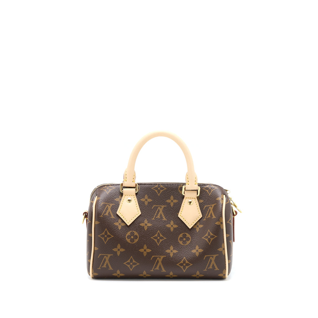 louis-vuitton-speedy-bandouliere-20-monogram-canvas-with-fuchsia-strap-ghw