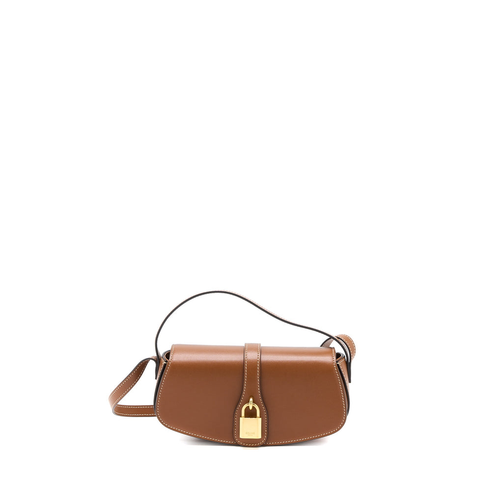 celine-clutch-on-strap-calfskin-brown-ghw