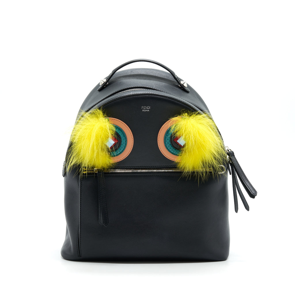 fendi-monster-backpack-in-black-with-yellow-fur
